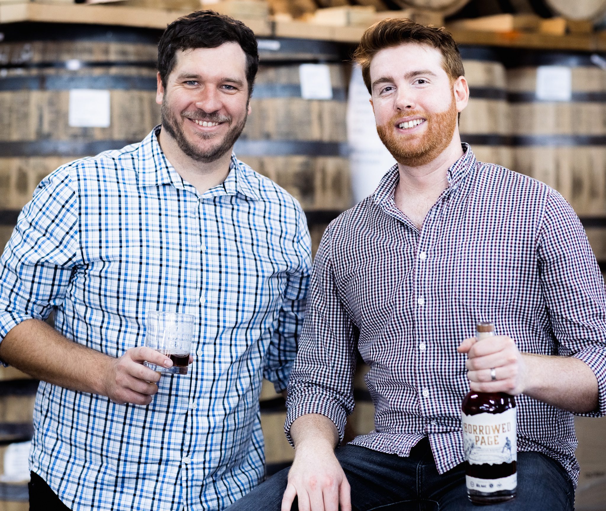 American Mash & Grain Founders  Devin and Chase with a bottle of Borrowed Page. 