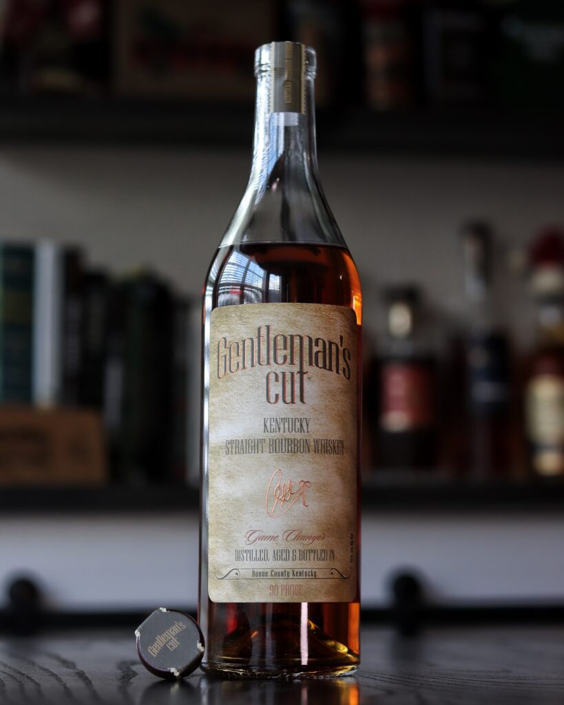 A bottle of whiskey on a tabletop.