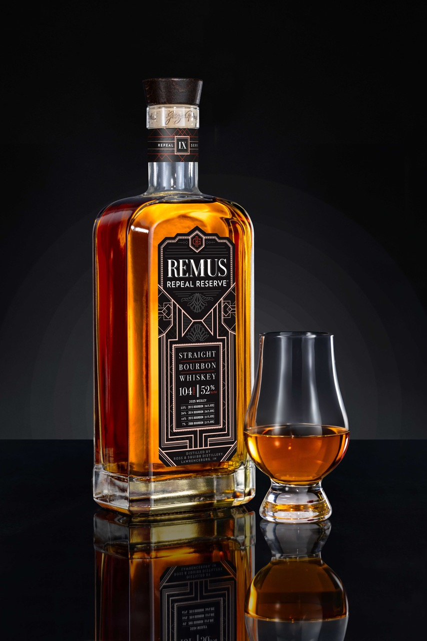 Bottle with a class on a table