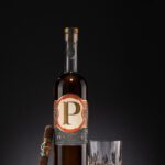 Penelope Cigar Session 2 with a cigar and a glass of whiskey