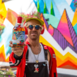 Breckenridge Distilling Art Series man holding the bottle