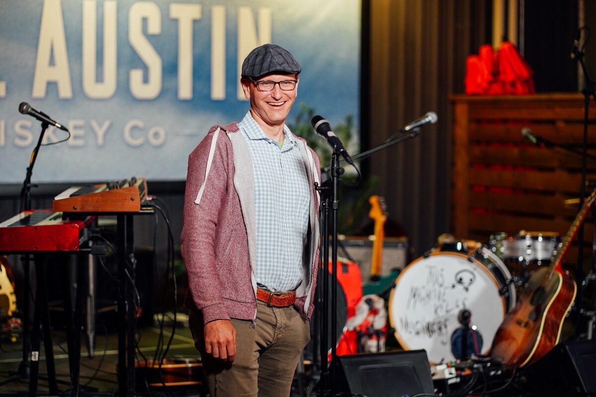Chris Seals co-founder of Still Austin on stage