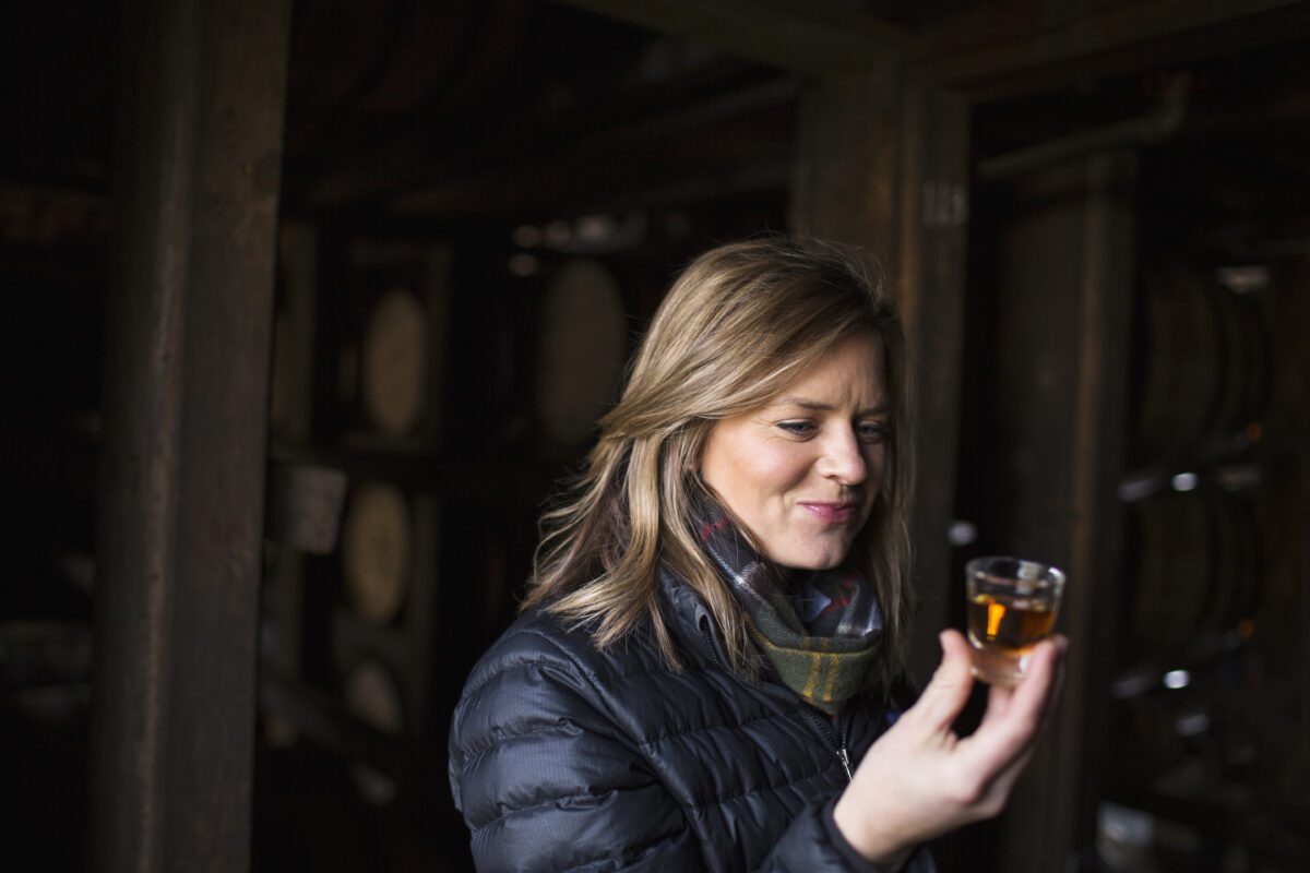 Elizabeth McCall Tasting whiskey