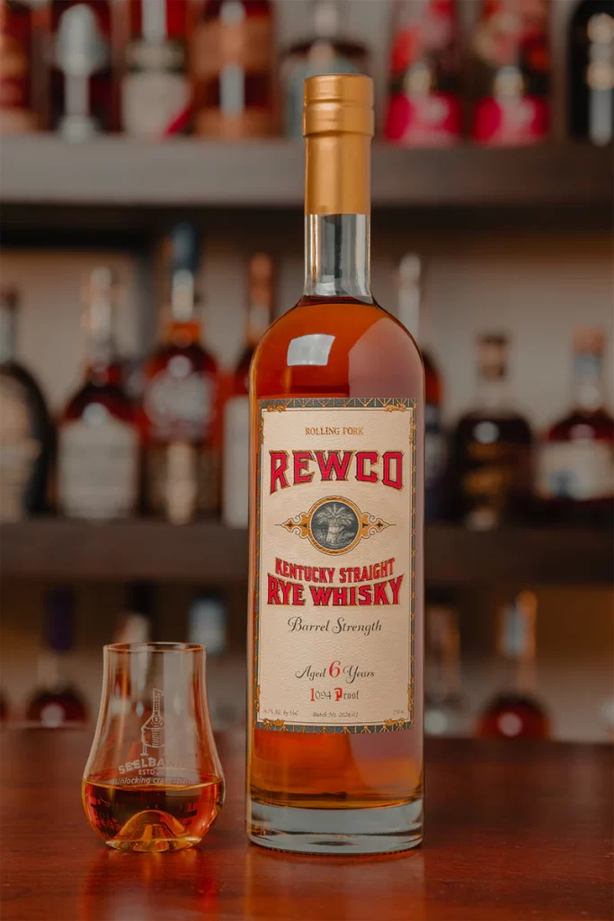 Rewco Rye on a bar with a glass.